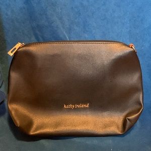 Very large black Kathy Ireland cosmetic case zipper compartments inside